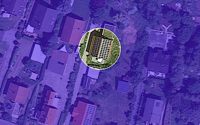 Lila eingefärbtes Drohnenbild einer Siedlung mit Fokus auf ein Solardach